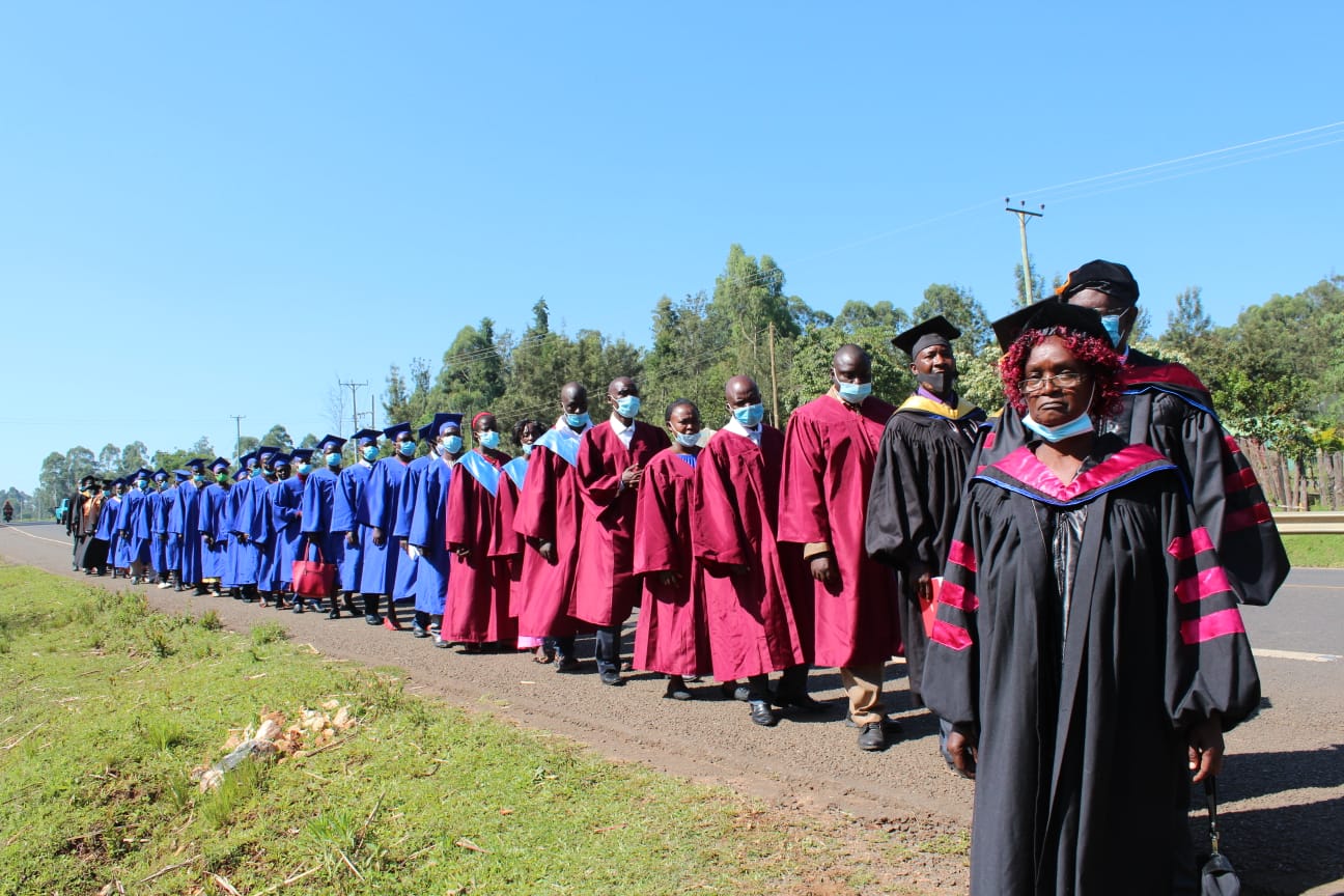 Jubilee Harvest College graduates and academic leaders in procession